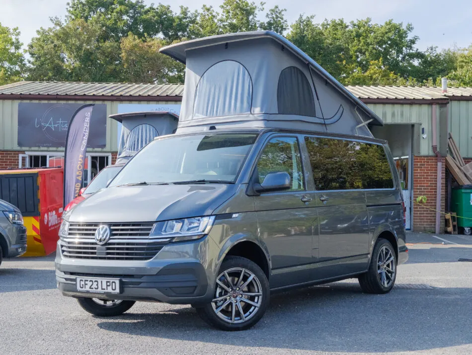 Grey campervan on the forecourt