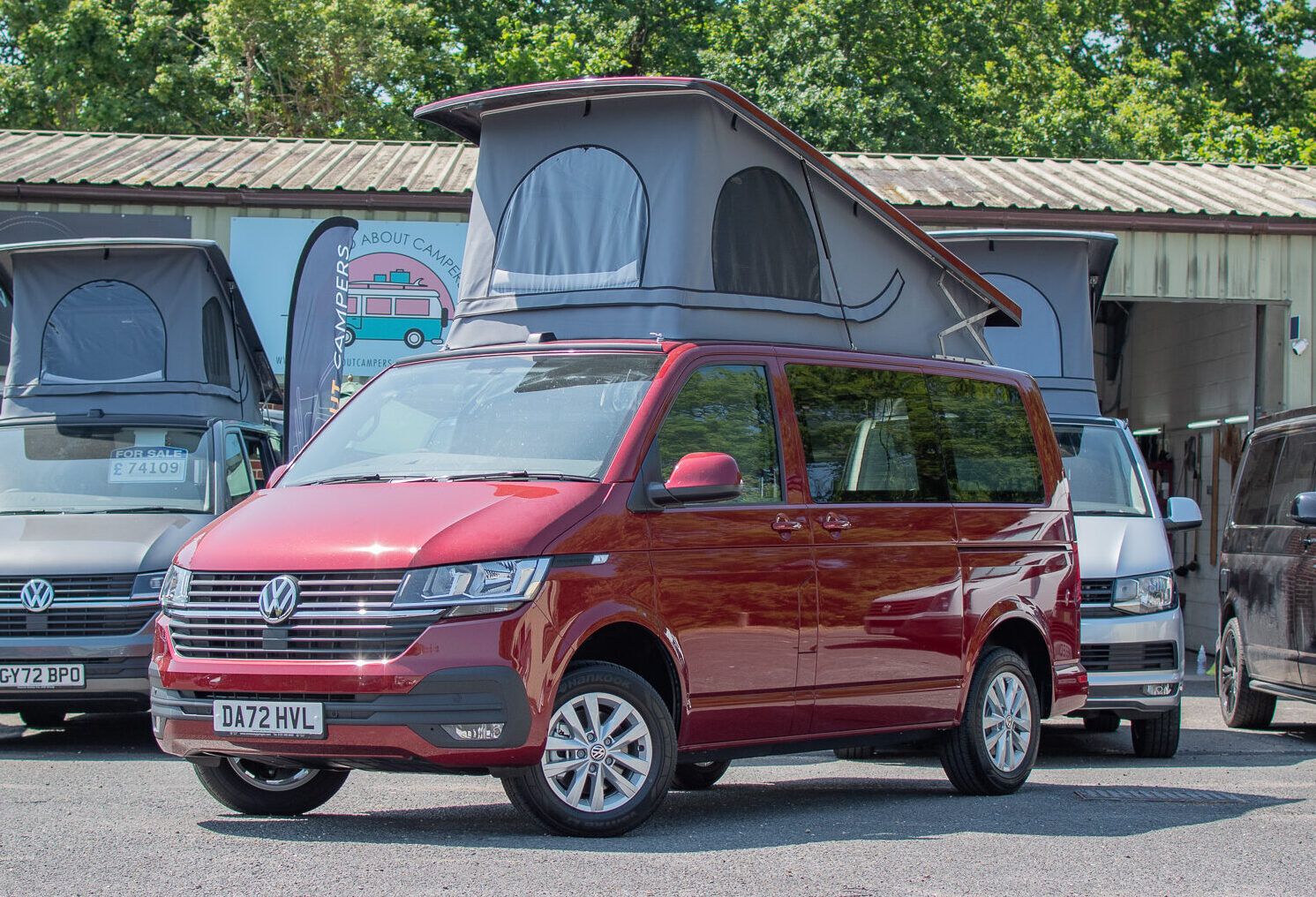 Red campervan on Forecourt