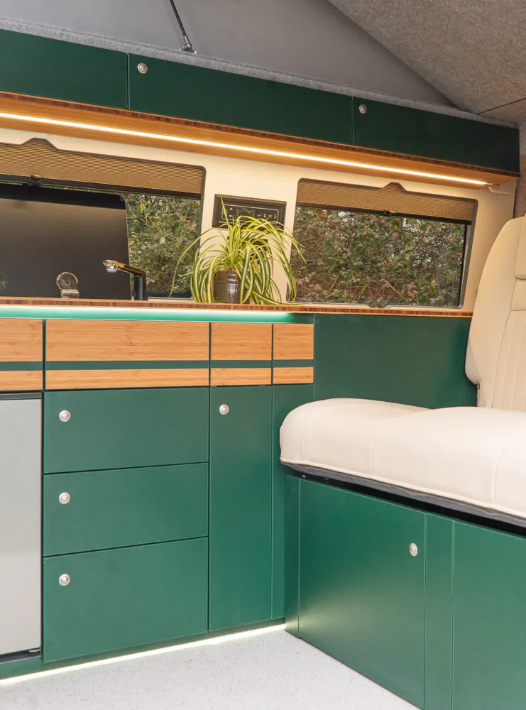 Green Furnishing in campervan with seatbelts