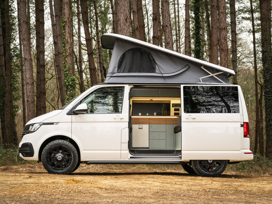 White campervan with outdoor shower