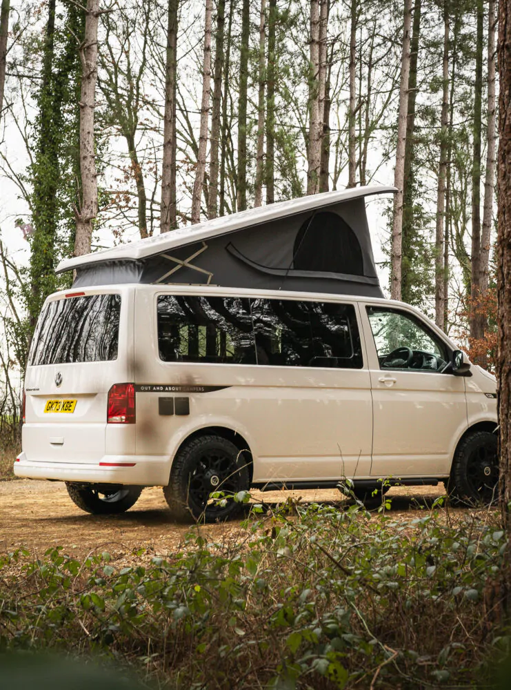 Back angle view of white campervan