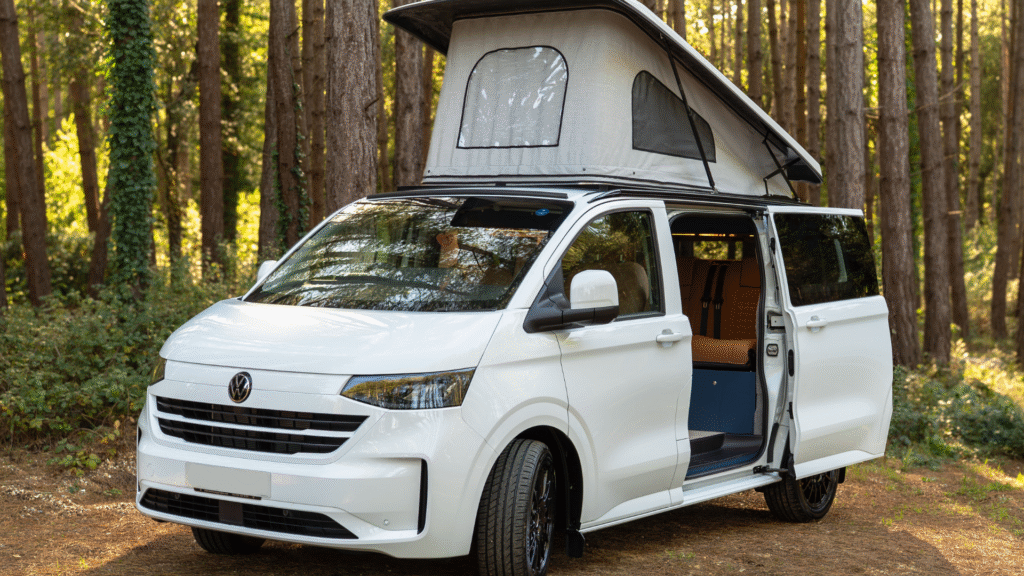 White T7 which has been converted into a campervan with a pop top and kitchen area
