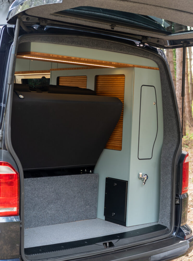 Camper boot, gas locker, rear shower and cupboard