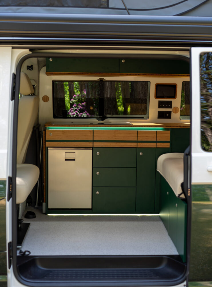Green kitchen with fridge/freezer