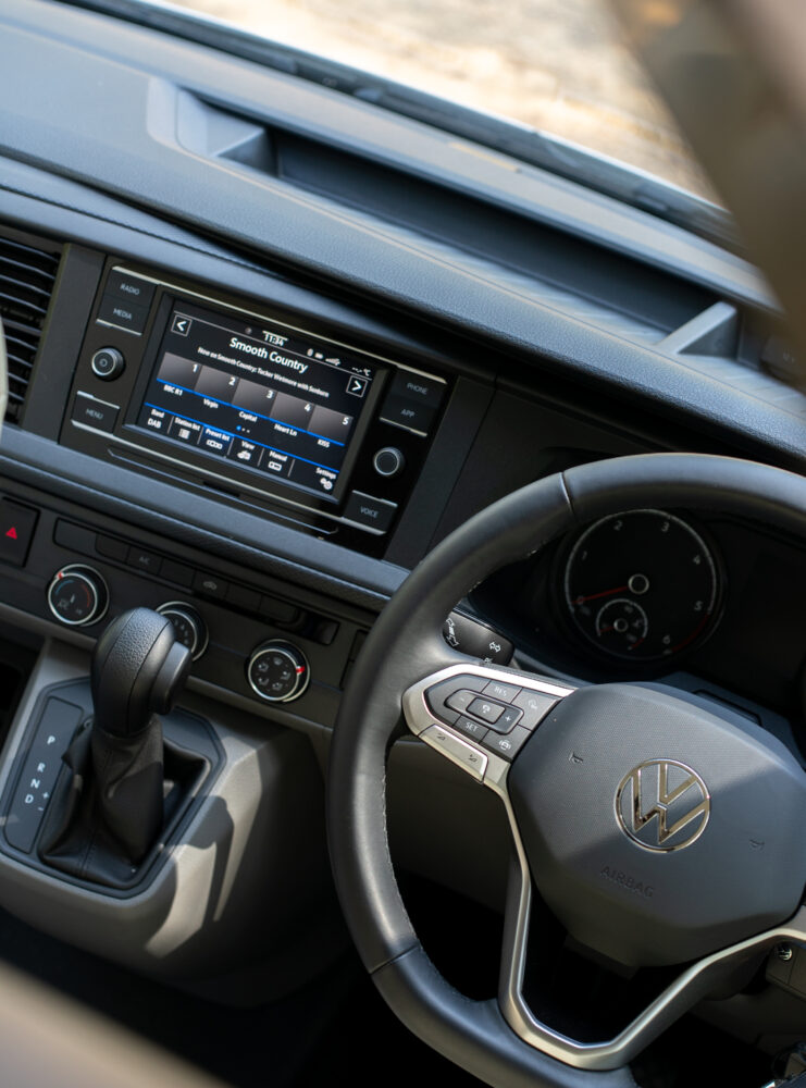 Multi-function steering wheel and touch screen carplay